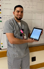VA Nurse VA nurse holding a tablet